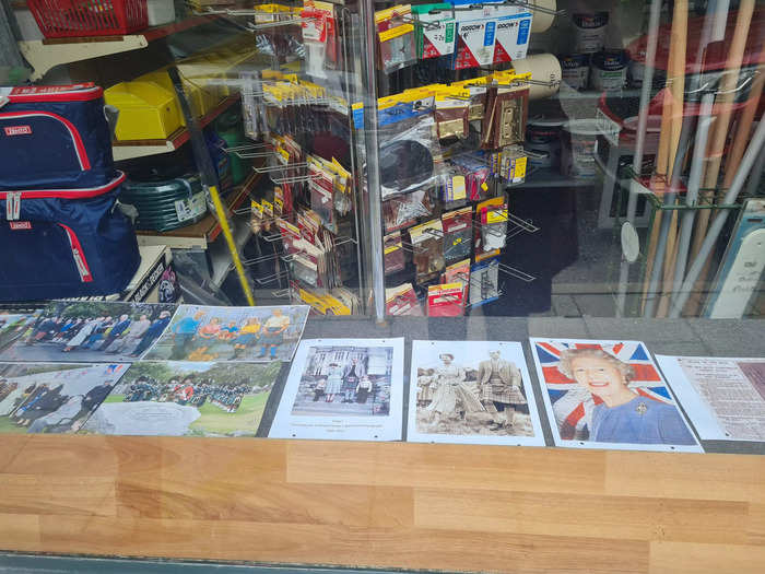 Local shops paid tribute to Her Majesty by displaying her photos in their windows.