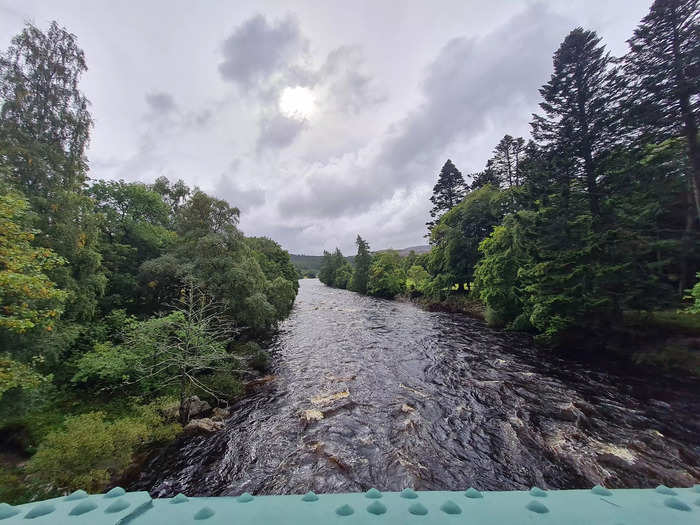 The castle was around a two-minute walk from where the bus was parked. I joined crowds of mourners who walked over a bridge that looked onto the River Dee before arriving at the gates.