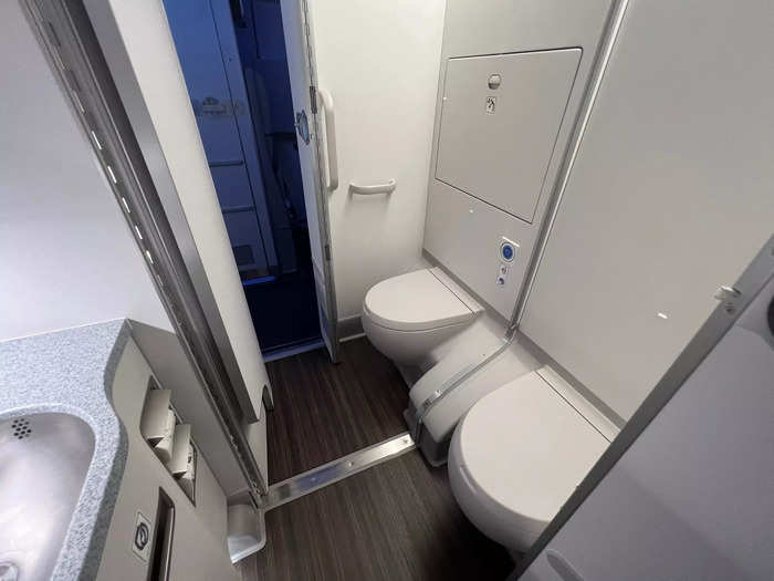 The middle set of bathrooms can be combined for travelers who need extra space by retracting the center wall.