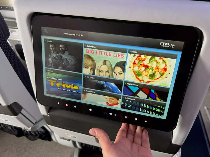 Like economy comfort, the standard seats come with inflight entertainment screens and a large tray table. The TV adjusts up when the seat in front is reclined.