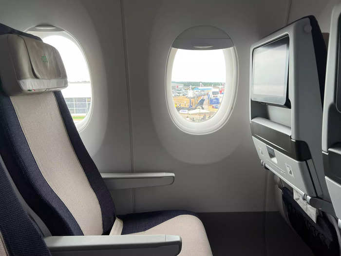 The other rows offer adjustable armrests and fold-down tray tables…