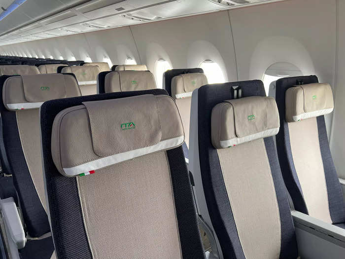 The first four rows, plus one additional set of three seats in front of that, are the company