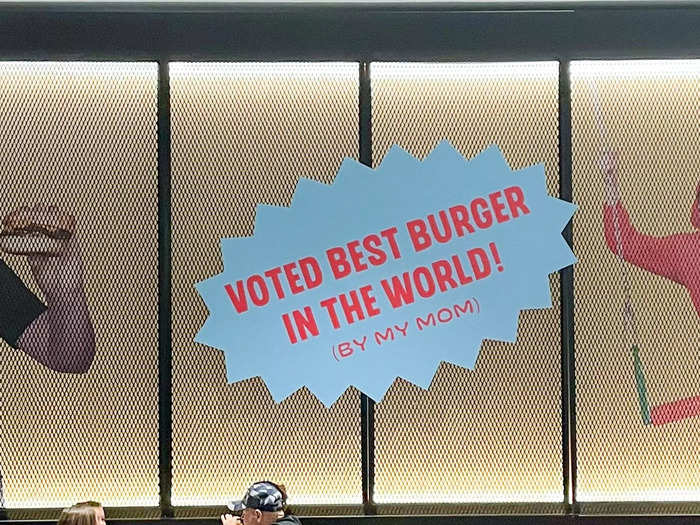 From the large picture of MrBeast holding a burger on the exterior walls of the restaurant …