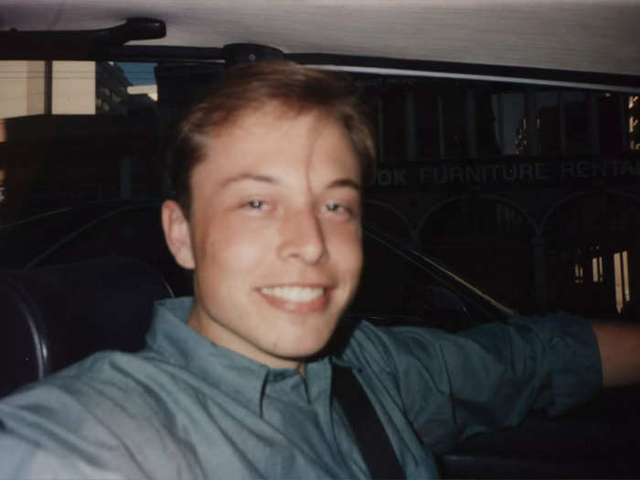 Musk inside the 1978 BMW 320i that he bought for $1,400 and repaired himself.