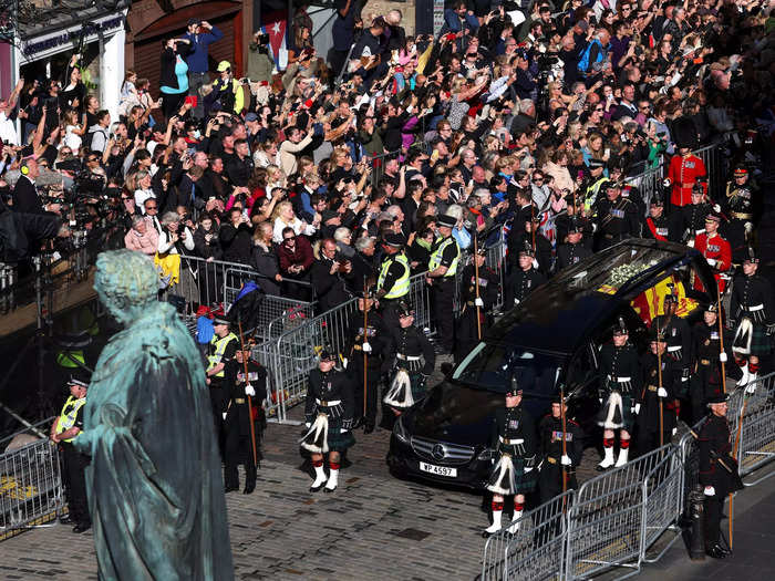 The BBC estimated some 20,000 people joined a mile-long queue to pay their last respects.