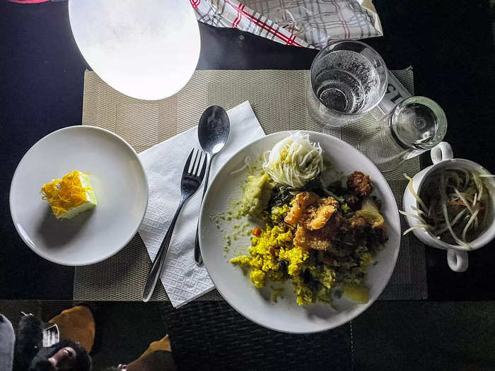 I had kha nom jeen, or rice noodles with curry sauce; pineapple rice with several fried and curried meats; som tum, or spicy papaya salad; and a dessert for dinner. I devoured it all and wanted to go for seconds, but the line just kept growing longer.