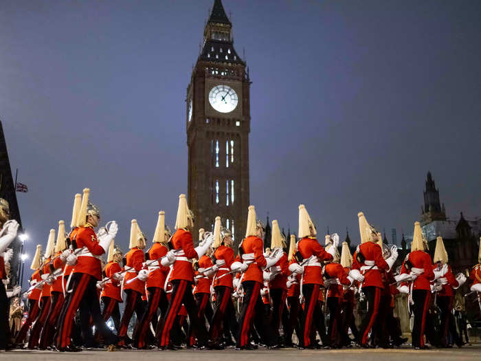 British soldiers and military horses gathered in full uniform in the early hours of Tuesday morning for a rehearsal for the Queen