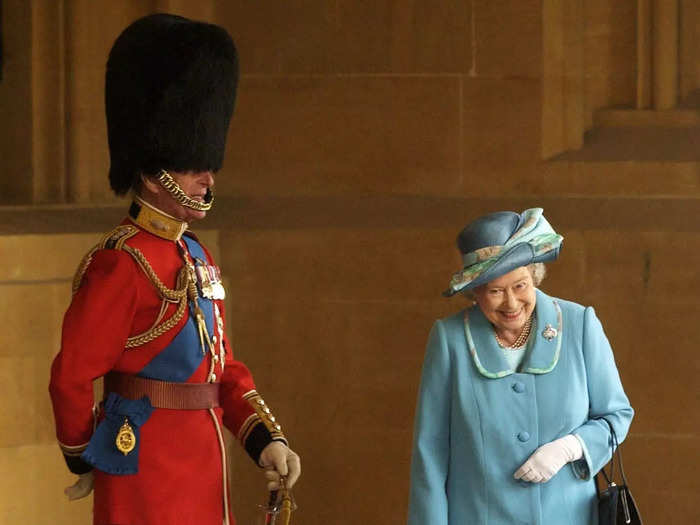 Queen Elizabeth was photographed giggling with Prince Philip when a swarm of bees interrupted an event at Windsor Castle in 2003.