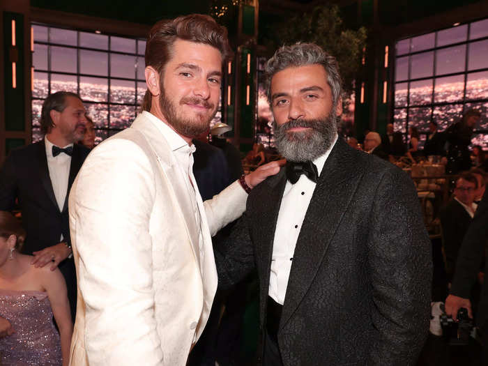 Oscar Isaac and Andrew Garfield, both of whom were nominated for outstanding lead actor in a limited or anthology series or movie, posed together for a photo at the awards.