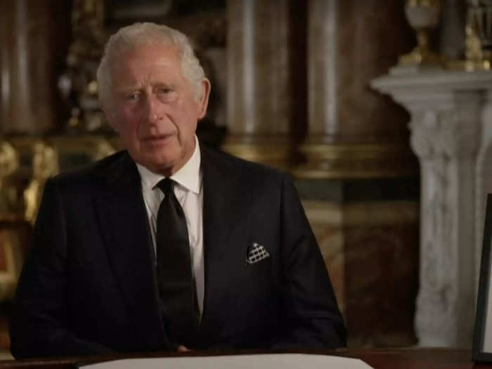 King Charles III made his first speech as monarch with a photo of his late mother by his side.