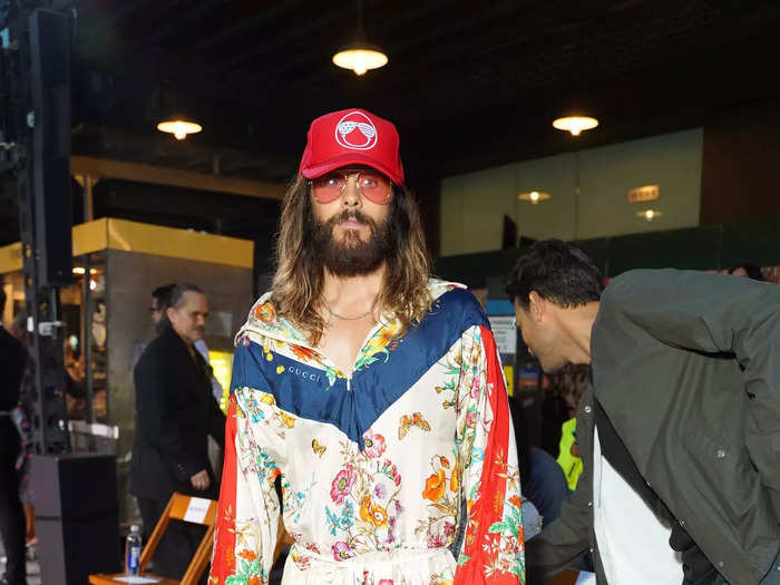 Jared Leto paired a floral jumpsuit with slide sandals.