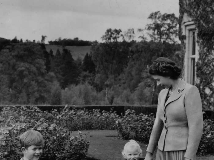 The growing family was photographed enjoying the estate at their Scottish holiday home of Balmoral Castle.