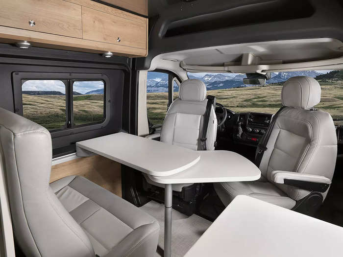 The tiny home on wheels can seat up to four people.
