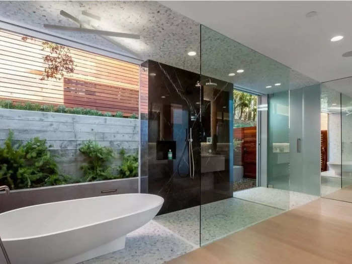 The walk-in shower and bath combination is enormous and luxurious.