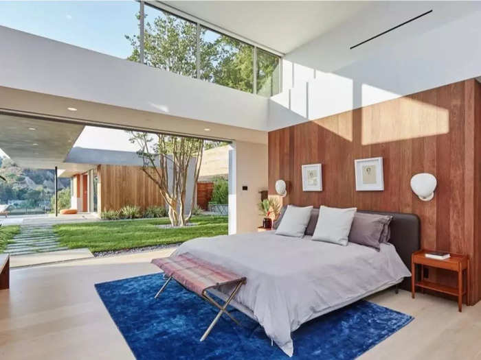 More large windows and natural light in the primary suite.