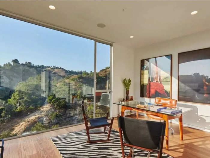 Inside, the house is filled with large windows and views that overlook the valley.