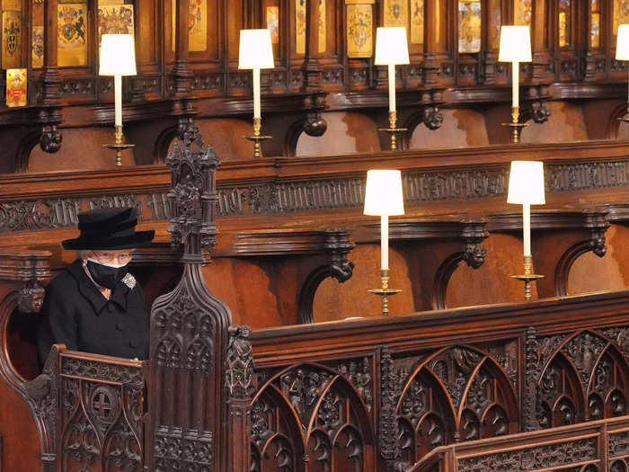 One of the most striking — and somber — photos of the Queen was taken at St. George