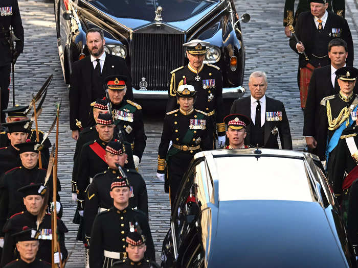 King Charles and his siblings, Prince Anne, Prince Edward, and Prince Andrew follow behind Queen Elizabeth