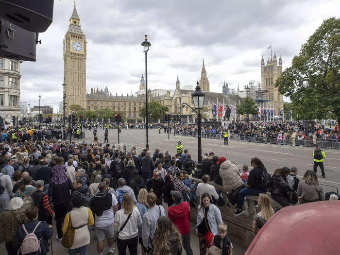 Many mourners stood near Westminster Abbey.