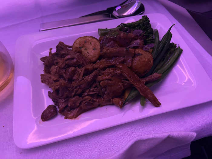 After the appetizers, I was served lamb with potatoes and green vegetables on the side…