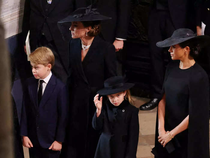Meghan Markle reunited with Kate Middleton before the funeral began on Monday.