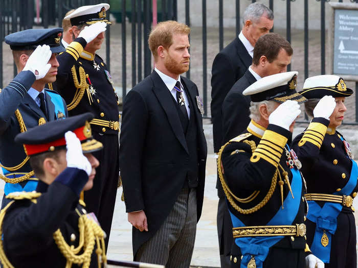 A striking photo captured the moment Prince Harry was not permitted to salute his grandmother