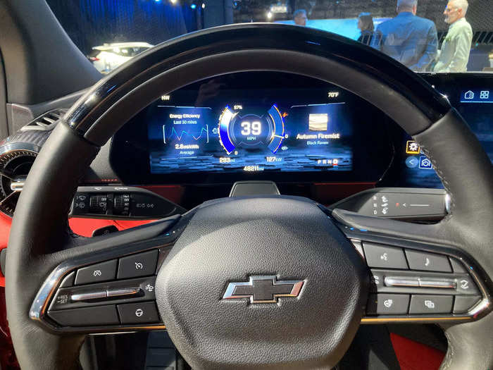 The cockpit features a colorful, 11-inch instrument panel that displays important driving info.