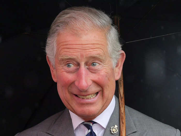 He appeared excited to receive a teddy bear for George at the Sandringham Flower Show in 2013.