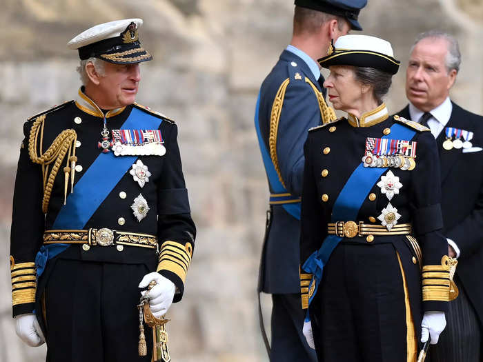 The new king and the princess appeared to look at one another for support at the Queen