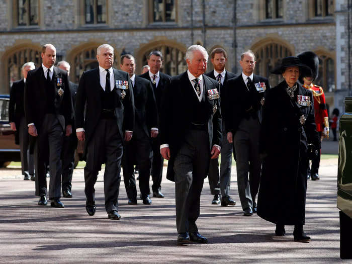 The siblings shared the same somber look as they lead the procession at their father Prince Philip