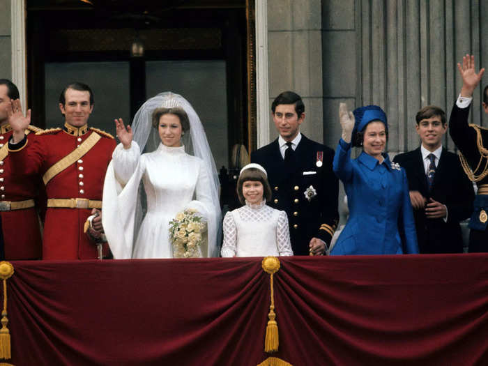 Charles stood by Anne on the balcony of Buckingham Palace on her wedding day in 1973.