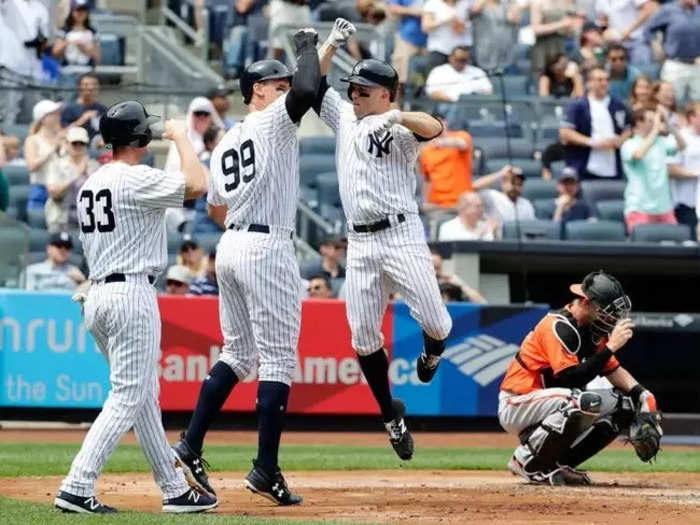 Brett Gardner has to jump if he is going to give Judge a forearm bash.