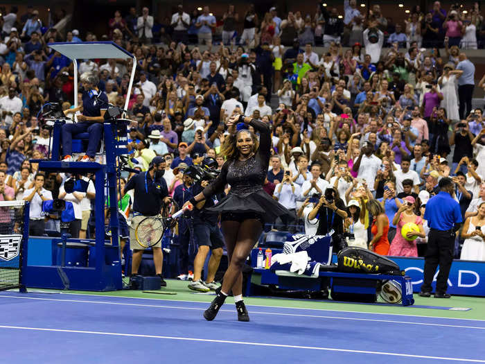 2022: Serena Williams offers the crowd at Arthur Ashe her signature twirl after winning her first-round match at the 2022 US Open.