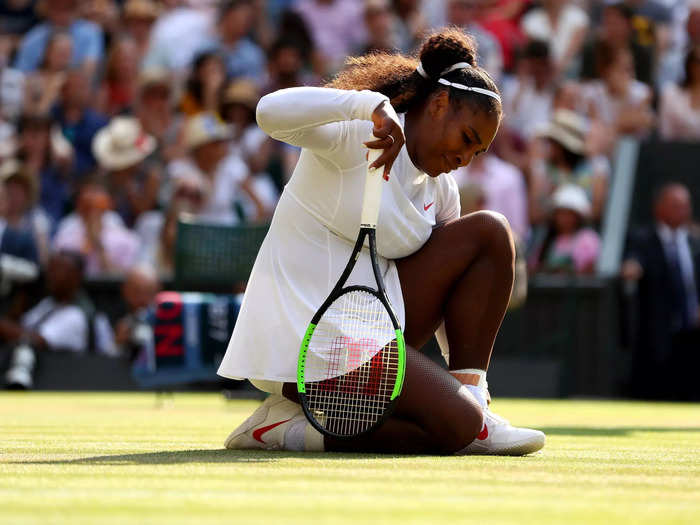 2018: A frustrated Serena Williams kneels on the court after losing a point during the 2018 Wimbledon final.