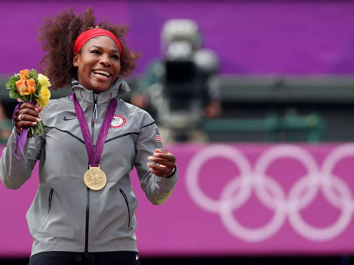 2012: Serena Williams poses with her gold medal after winning the women