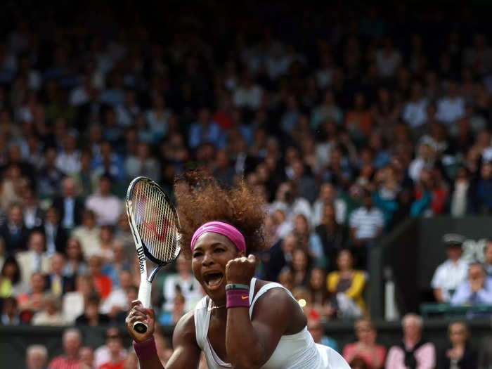 2012: Serena Williams jumps for joy after winning her third-round match at Wimbledon.