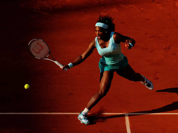 2012: Serena Williams plays a forehand shot in her first-round match at the 2012 French Open.