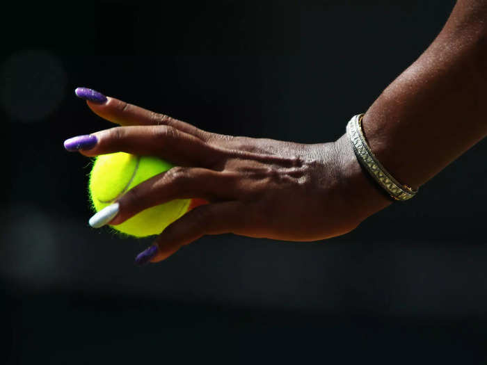 2011: Serena Williams prepares to serve the ball during her fourth-round match at Wimbledon in 2011.