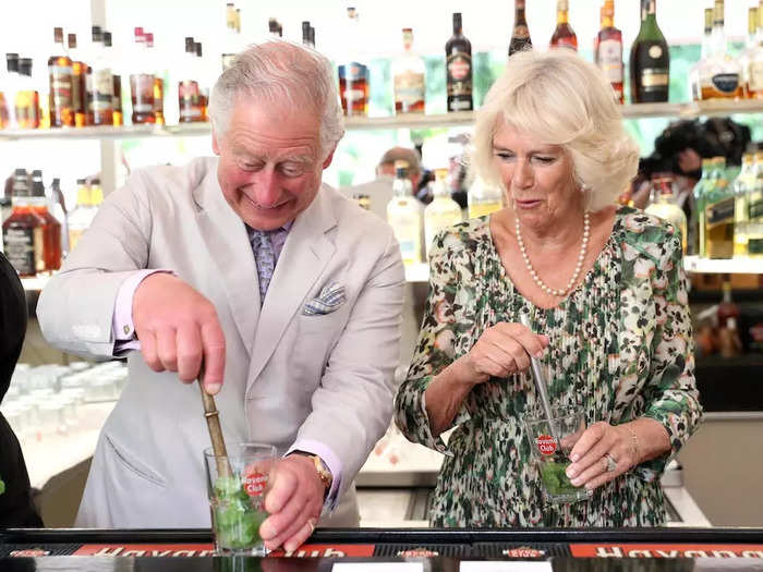 Charles gleefully prepared a mojito on a visit to Cuba in 2019.