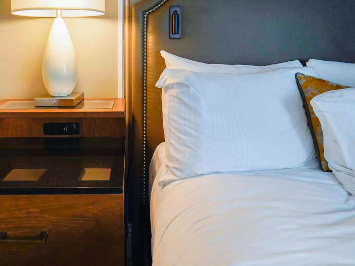 Nightstands on either side of the bed had modern touches like easily accessible outlets.