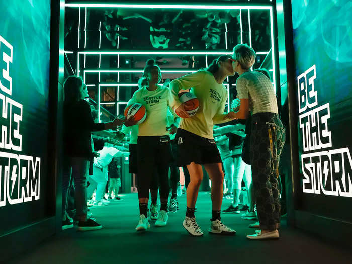 8/7: Sue Bird of the Seattle Storm kisses her fiancee, Megan Rapinoe, before the last regular season home game of her career against the Las Vegas Aces in Seattle, Washington.