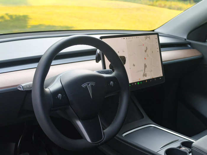 Tesla rejects almost all conventional buttons and gauges in favor of a sleek and uncluttered look.