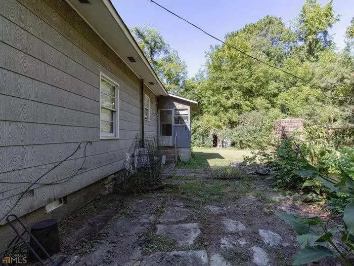 The 3-bedroom, 2-bathroom abode is in need of a "full rehab" and is located on a 6.17 acre lot, according to the listing from eXp Realty agent Michael Smith.