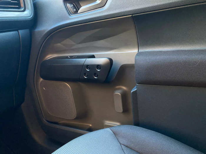 It has funky door handles and door pockets designed to fit a large water bottle.