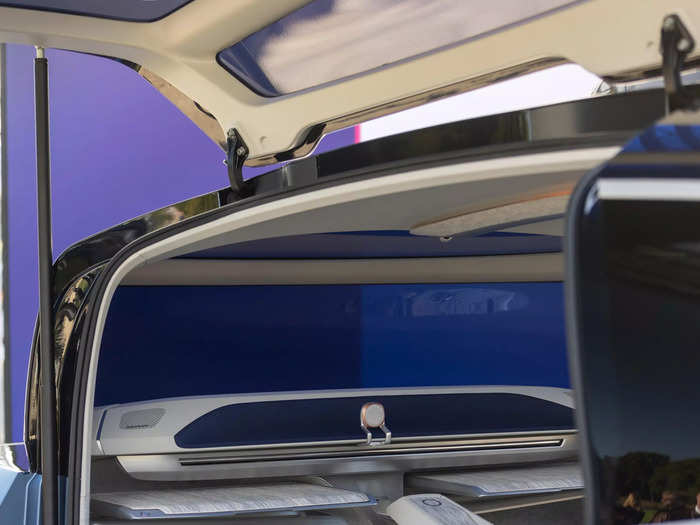 If passengers are traveling overnight, a two-seat configuration folds down into two beds measuring 6.5 feet long. Seat belts and airbags are integrated into the duvet for safety purposes, VW said.