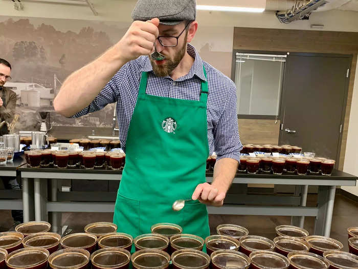 In this room, specially-trained Starbucks employees taste as many as 100 cups of coffee per day to ensure they