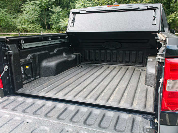 First off, the Lariat came with a spray-in bed liner that made its bed less slippery to stand on and more durable.