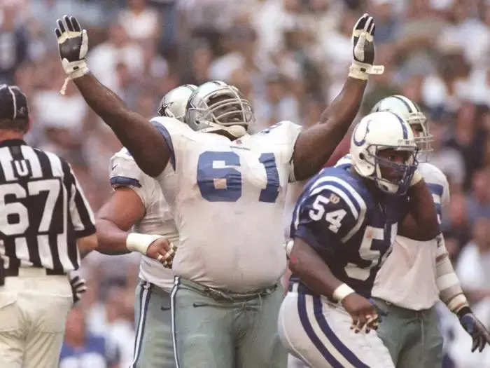 Nate Newton (No. 61), a 320-pound offensive lineman, played most of his 14-year career with the Cowboys before retiring in 1999 and growing to nearly 400 pounds in retirement.