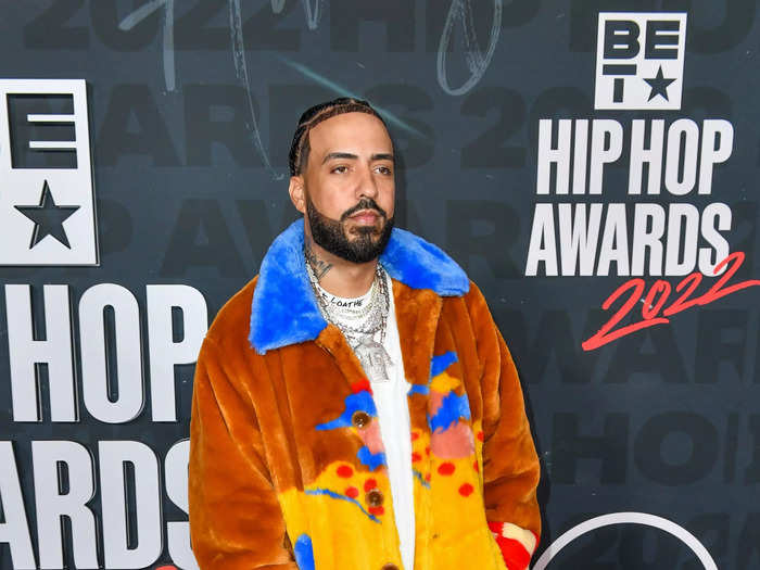 French Montana leaned into a stylish yet comfortable vibe with a colorful, faux-fur coat over a white shirt and loose jeans.