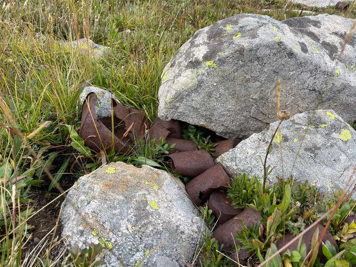 Along one sloping hill, I noticed dozens, if not hundreds, of rusting cans.